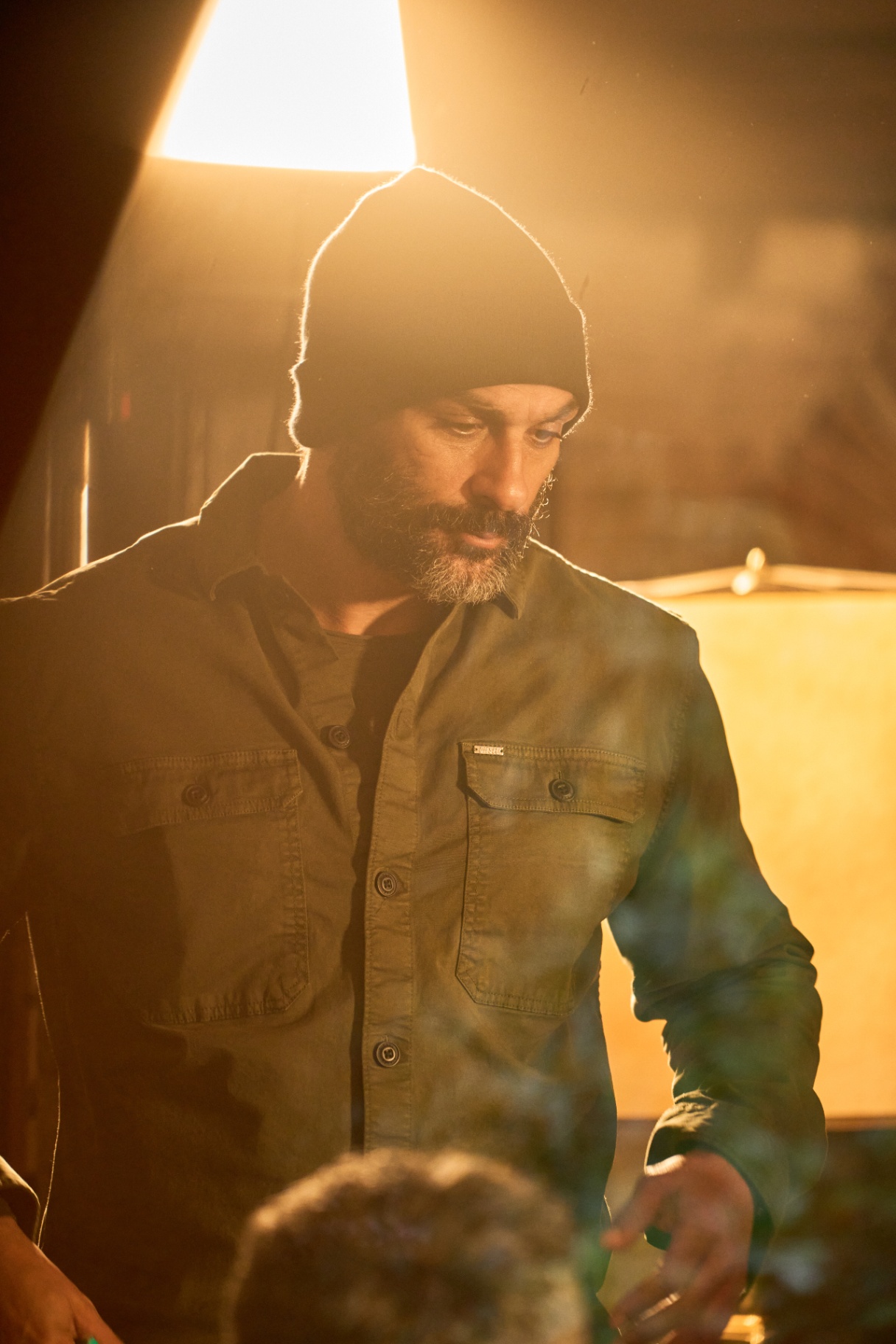 Eriadorfilm — actor in warm backlight on set